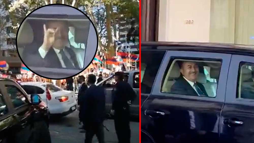 Mevlüt Çavuşoğlu, Uruguay'da kendisini protesto eden Ermenilere bozkurt işareti ile yanıt verdi