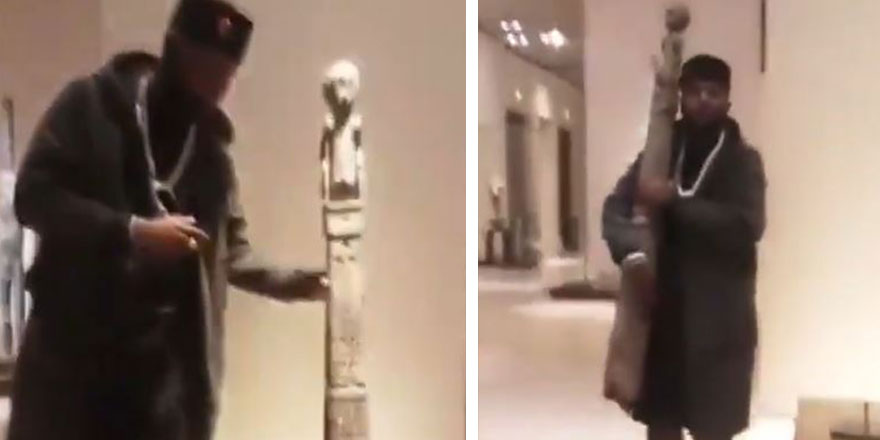 Afrikalı adamdan Fransa'daki Louvre Müzesi'nde ilginç eylem