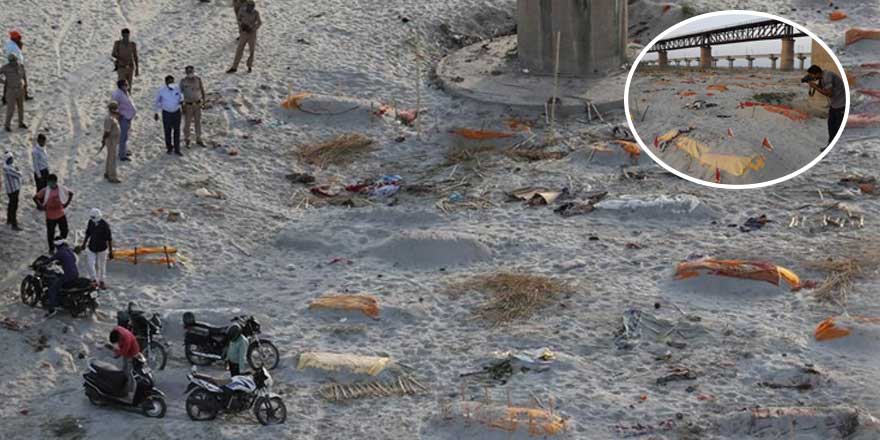 Ganj nehri kıyılarına gömülmüş yüzlerce cesedi ortaya çıkardı
