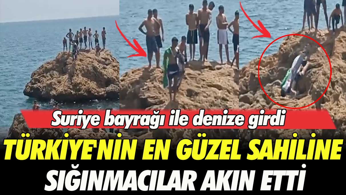 Türkiye’nin en güzel sahiline sığınmacılar akın etti: Suriye bayrağı ile denize girdi