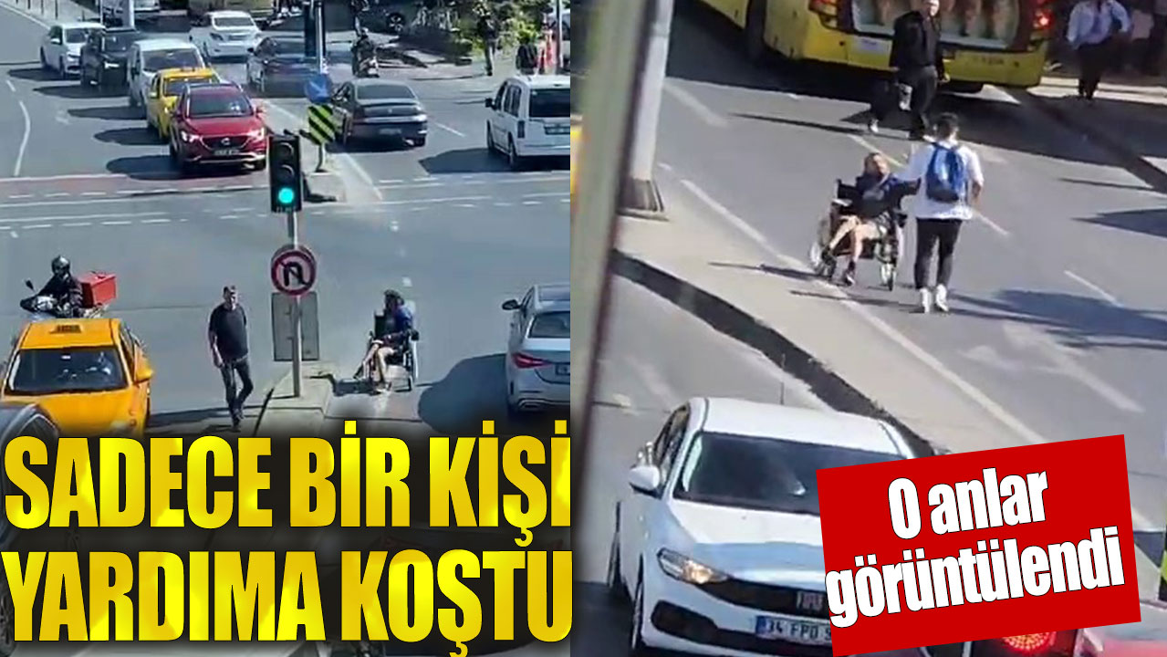 Trafiğin ortasında kalan tekerlekli sandalyeli adamın yardımına koştu