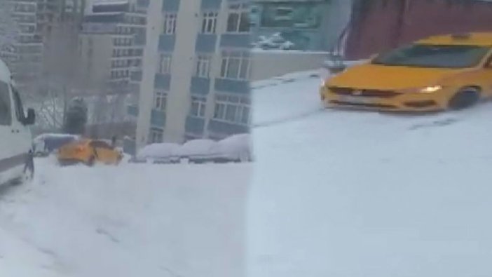Kağıthane'de karda bir taksi kayınca müşteri dışarı atladı!