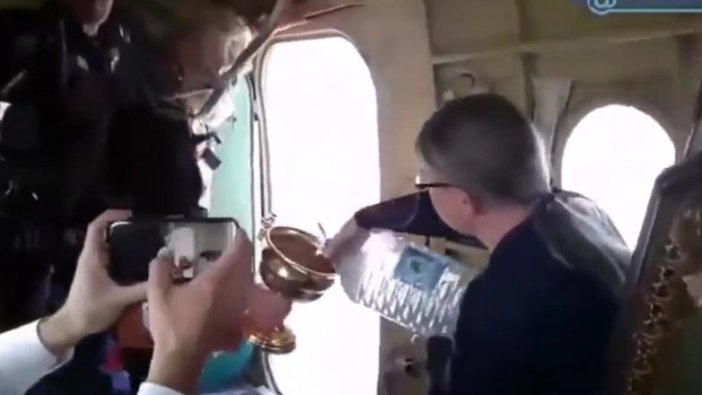 Rusya'da papazlar virüse karşı helikopterle kutsal su döktü