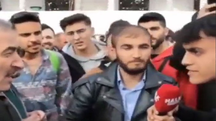 Sokak röportajında Erdoğan taraftarı olan şahsa bir genç tarafından sert tepki