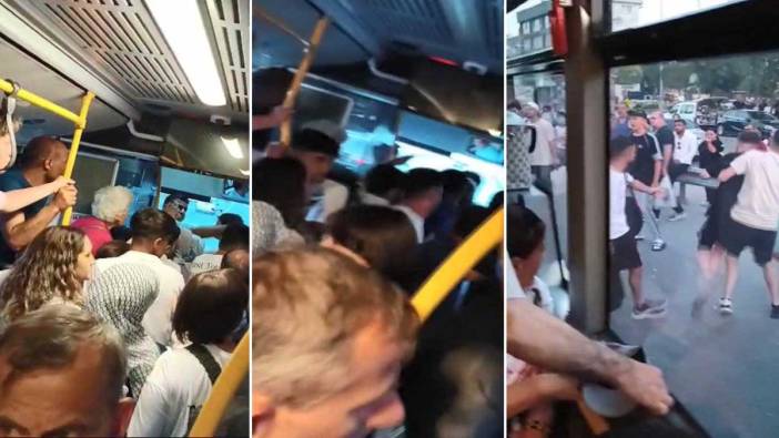 Otobüsün kapılarını açmayan şoföre sinirlenen yolcular otobüsü tekmeledi