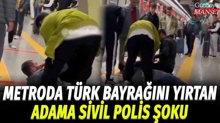 Metroda Türk bayrağını yırtan adama sivil polis şoku